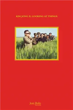 Kim Jong Il looking at things