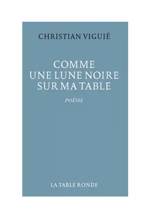 Comme une lune noire sur ma table