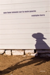 Une lune tatouée sur la main gauche - Rodolphe Barry